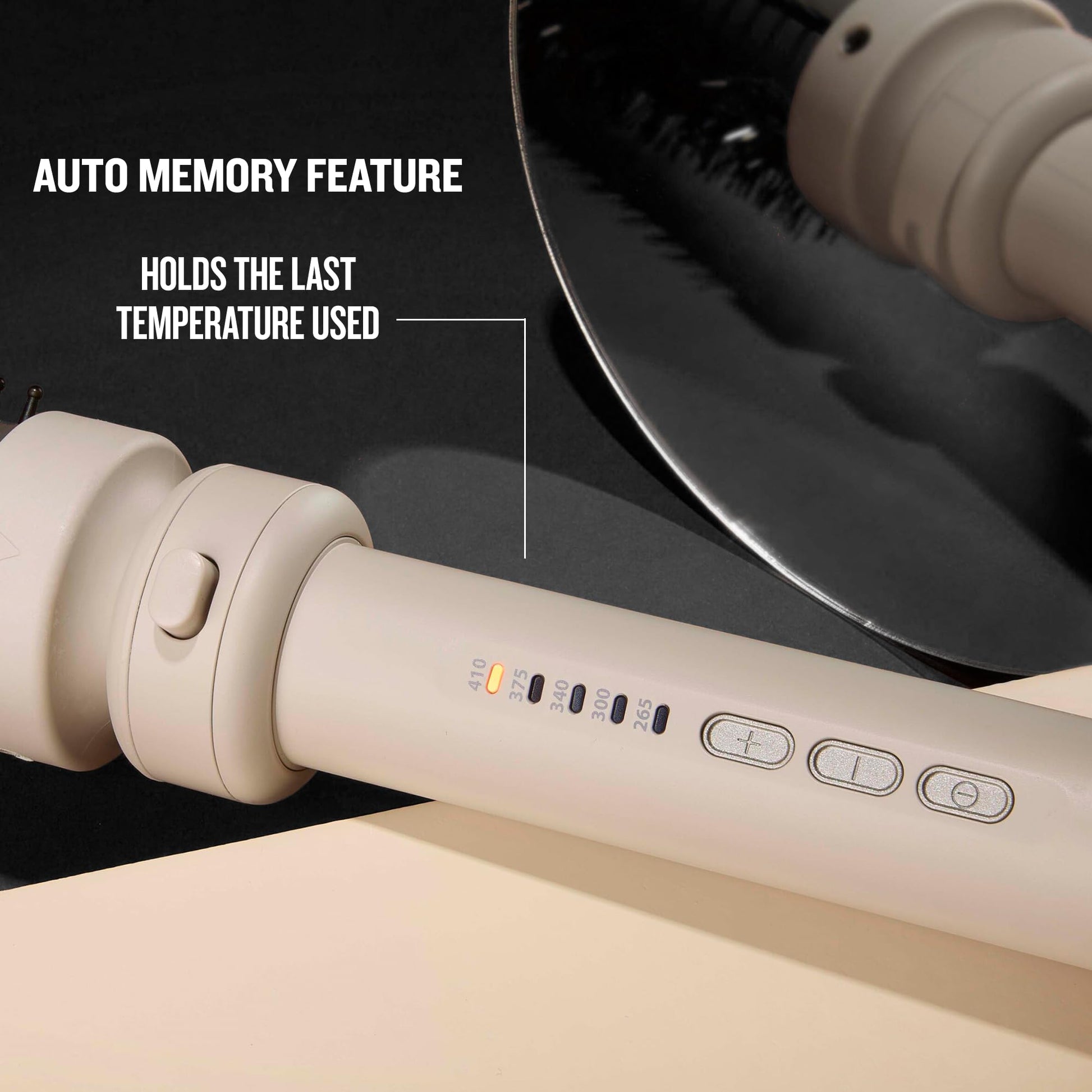 Close-up of the digital temperature control interface on the handle of the Remington hair curler.