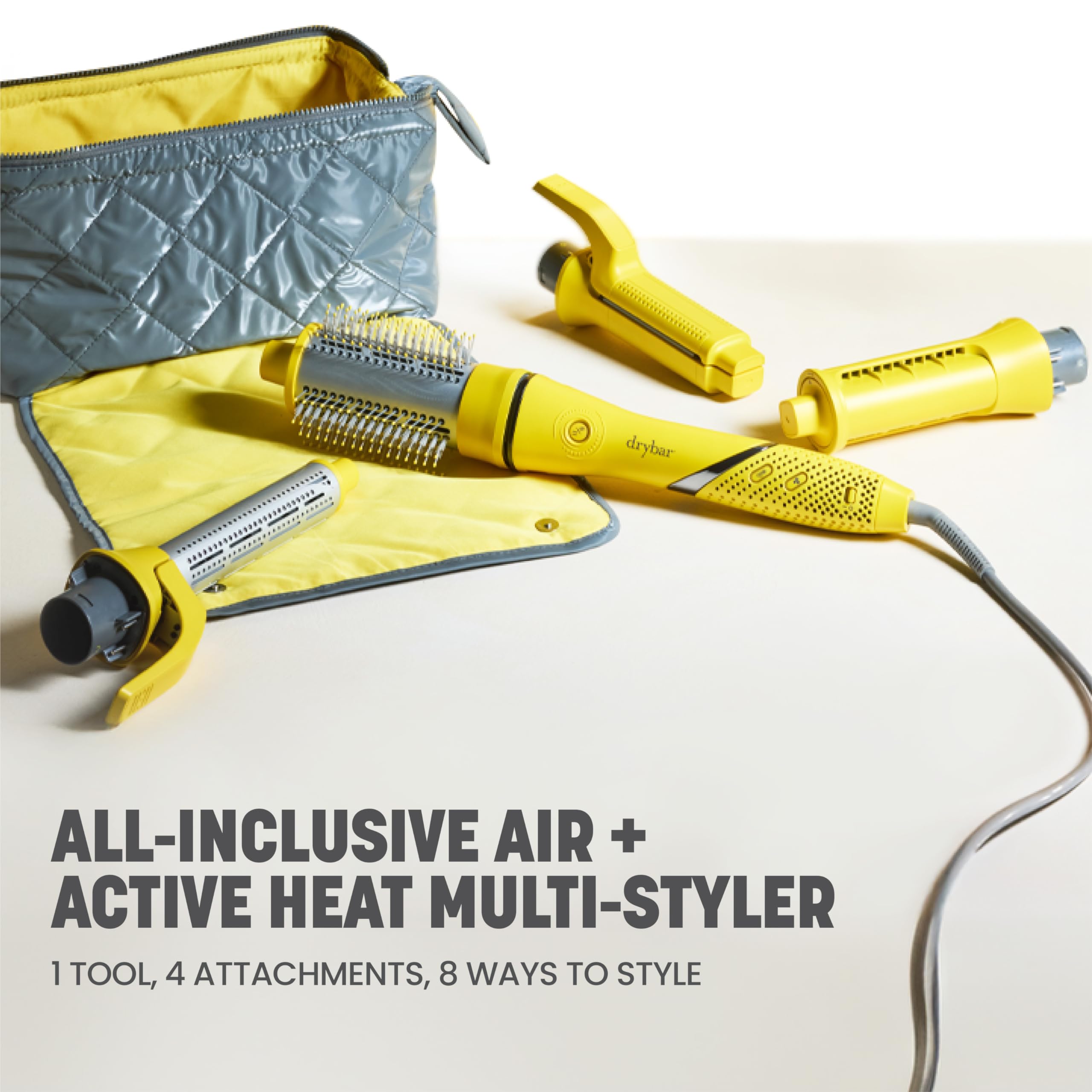 Drybar 8-in-1 hot air styling tool with its four interchangeable dual-use attachments neatly displayed.