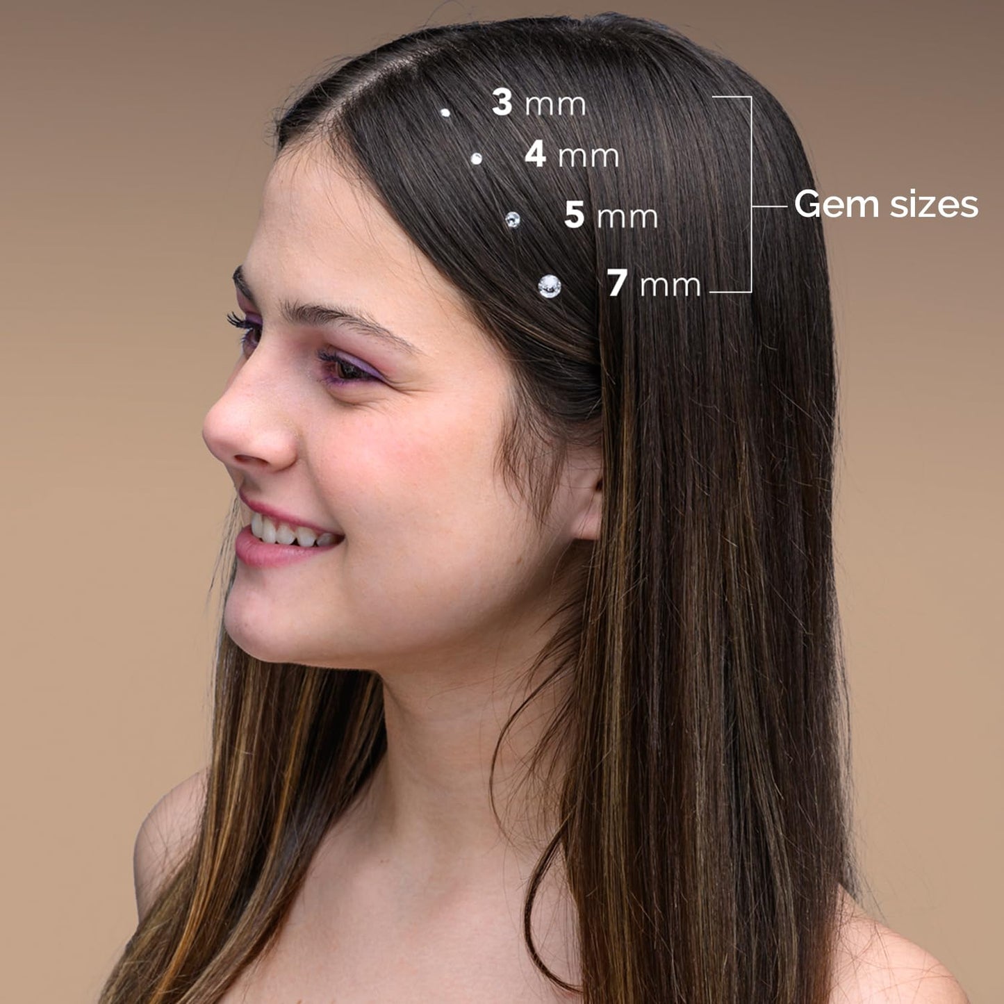 Model showcasing sparkling pink and gold crystals applied safely to her hair