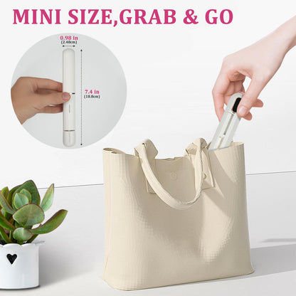 DENTAISyn travel hair straightener held in hand to illustrate the lightweight ergonomic grip.