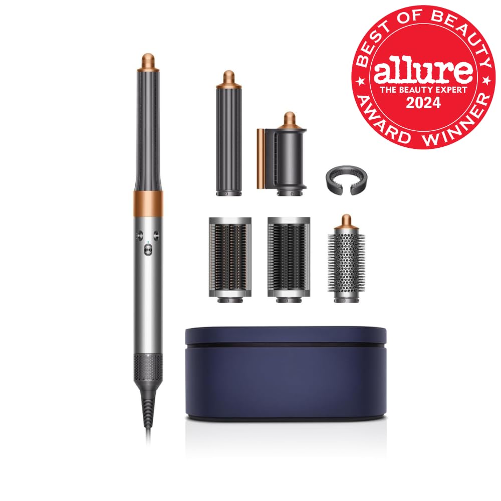 Dyson authentic USA imported hair styler with six attachments arranged neatly on a surface.