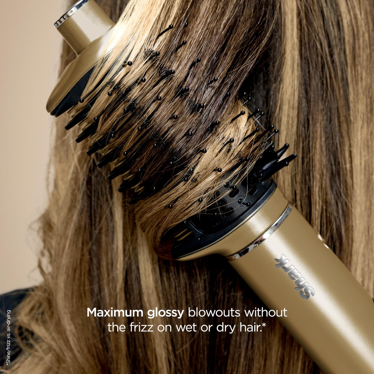 Side view of the ergonomic gold handle of the Shark Glam luxury hair tool
