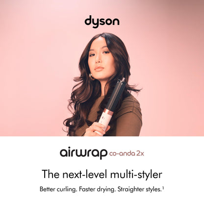 Dyson luxury hair styling tool with six attachments displayed on a premium vanity table