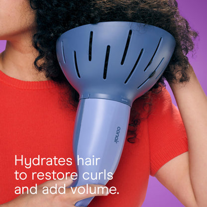 Conair steam therapy styler being used to detangle and volumize curly hair patterns.