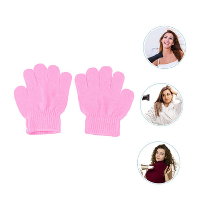 Compact and lightweight design of hair drying gloves next to travel bag