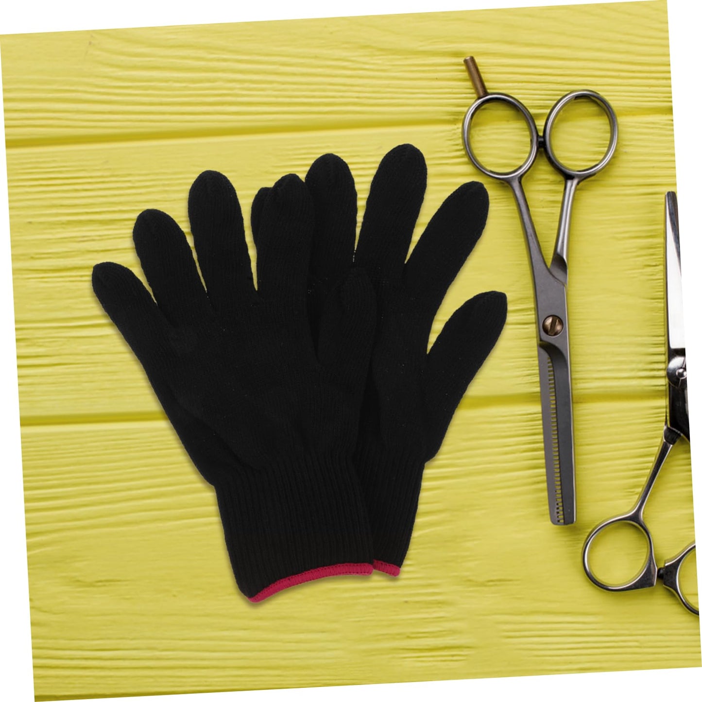 Close up of the protective anti scald hair styling mitts for curling wands.