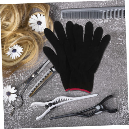 A pair of professional salon heat protection gloves for safe flat iron use.