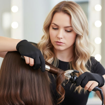 Vhermosa reusable hair dye and heat protector glove being used with a hot curling wand tool