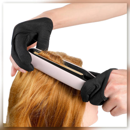 Ambidextrous styling glove demonstrated on a left hand handling a hair styling tool safely
