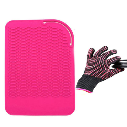 AFT90 professional heat blocking glove being worn during a hair curling routine.