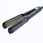 Close up of the LED display and adjustable temperature buttons on the Wangmeili crimping iron.