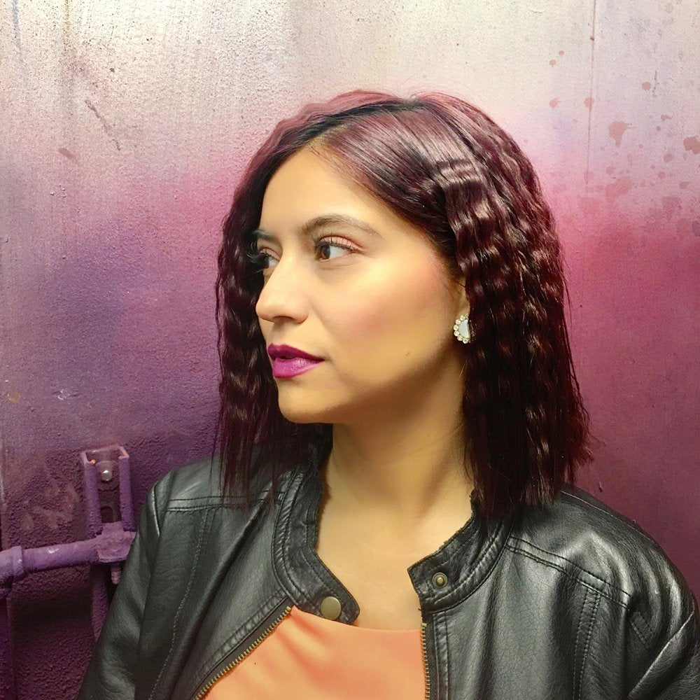 Angled view of the authentic Bed Head Waveaholic pink crimper for styling textured volume