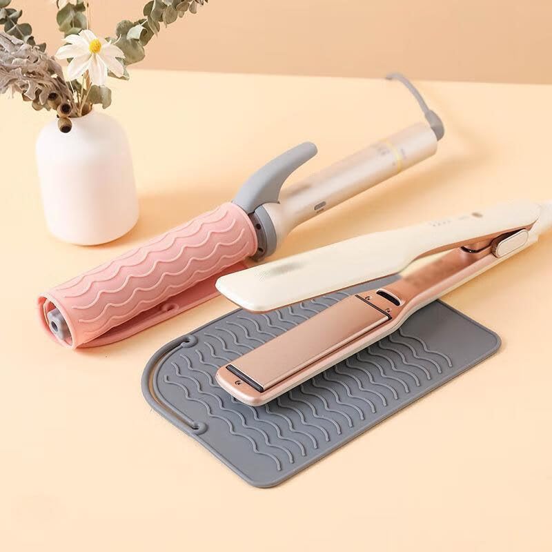 Universal size hair straightener mat protecting a modern bathroom vanity countertop