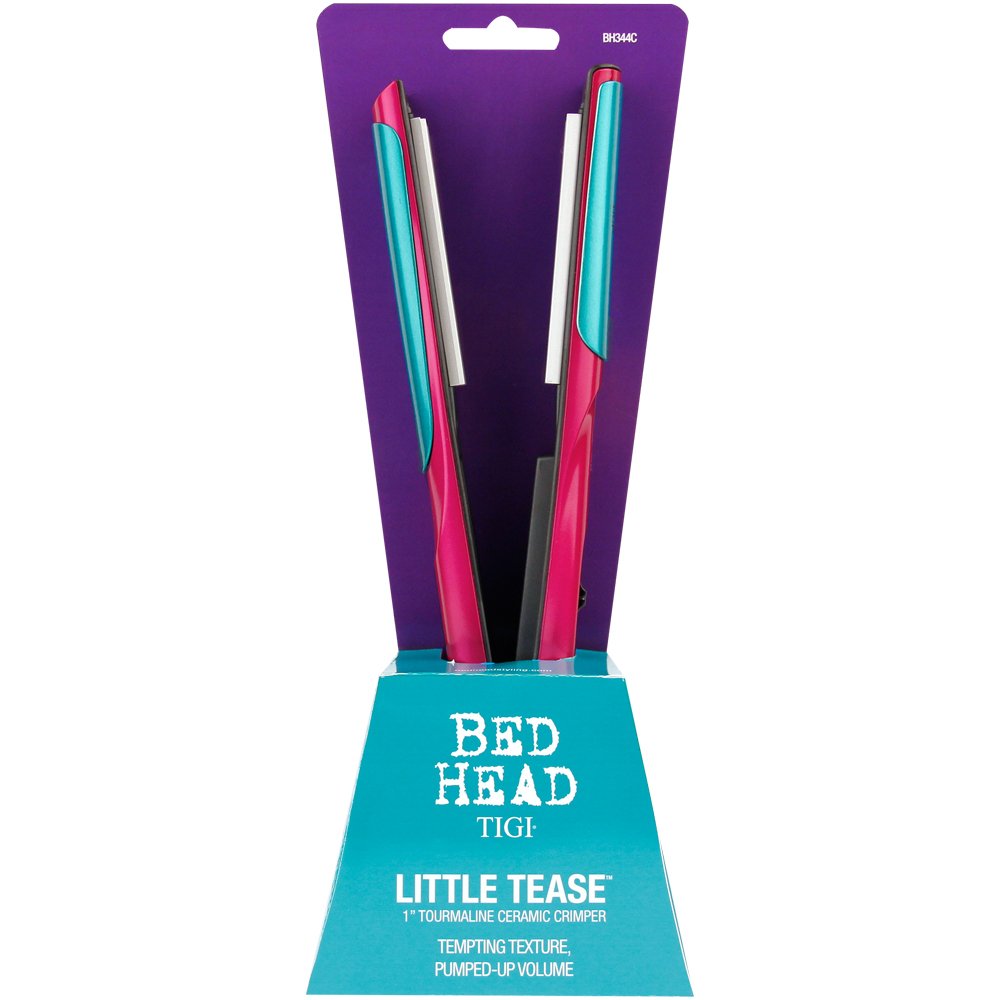 Ergonomic handle and power switch indicator on the pink Bed Head hair styling tool