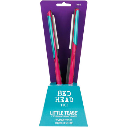 Ergonomic handle and power switch indicator on the pink Bed Head hair styling tool