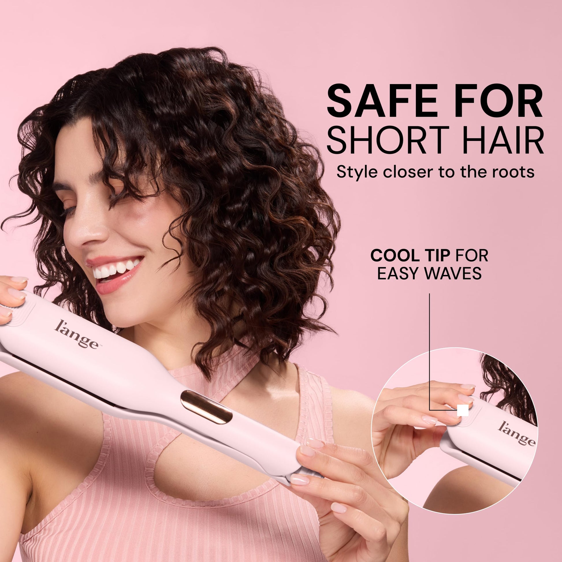 L'ange Hair SculptWaver titanium deep wave iron resting on a heat resistant surface.