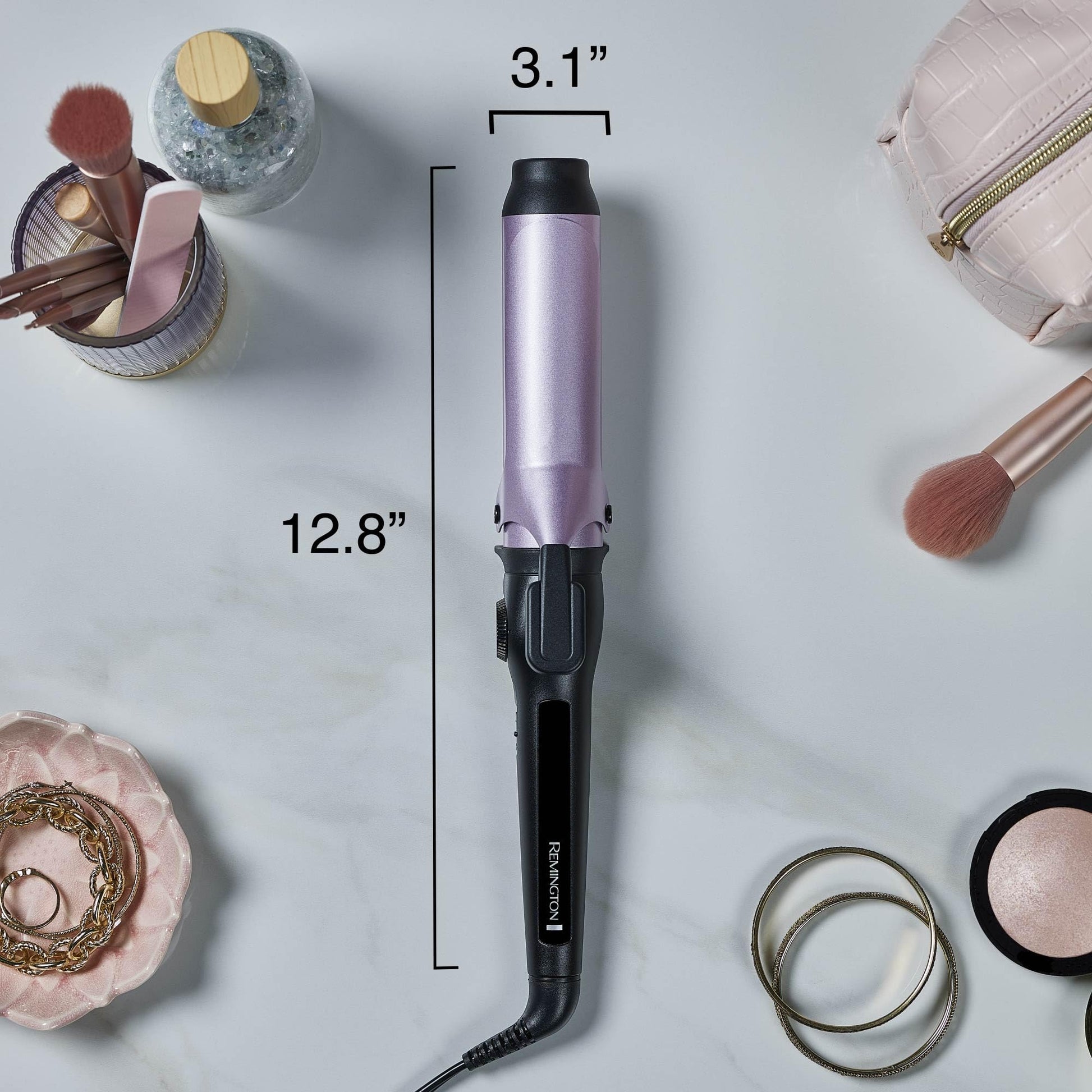 Full retail packaging view of the USA imported Remington anti static one point five inch ceramic styling tool.