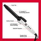 Side profile of the Revlon imported hair styling tool highlighting the ergonomic handle and clamp.
