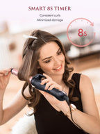 LANDOT automatic hair styling wand showing the two way rotation buttons and ergonomic handle.