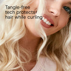Conair ceramic auto curler highlighting the directional rotation options and premium gold accents
