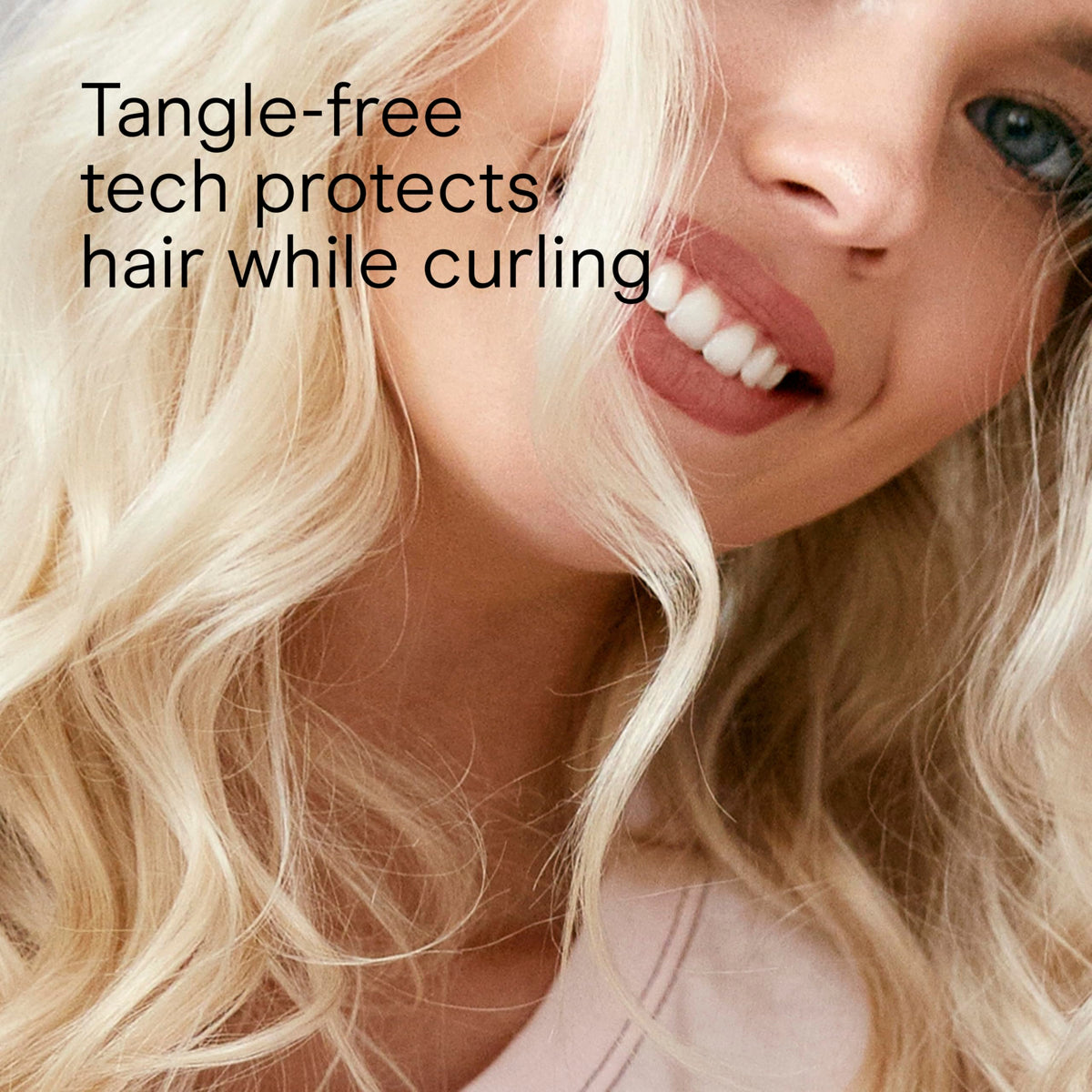 Conair ceramic auto curler highlighting the directional rotation options and premium gold accents