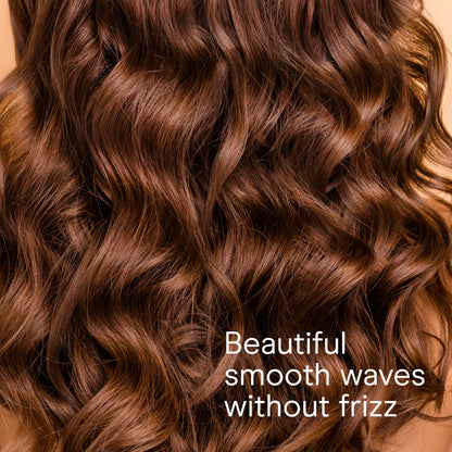 Premium imported Conair hair curler showing the power button and turbo heat indicator