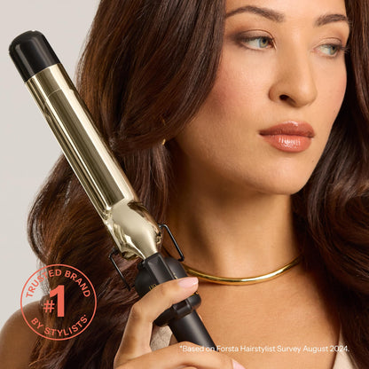 Side view of the Hot Tools 2-inch curling iron showing the spring clamp handle and cool tip.