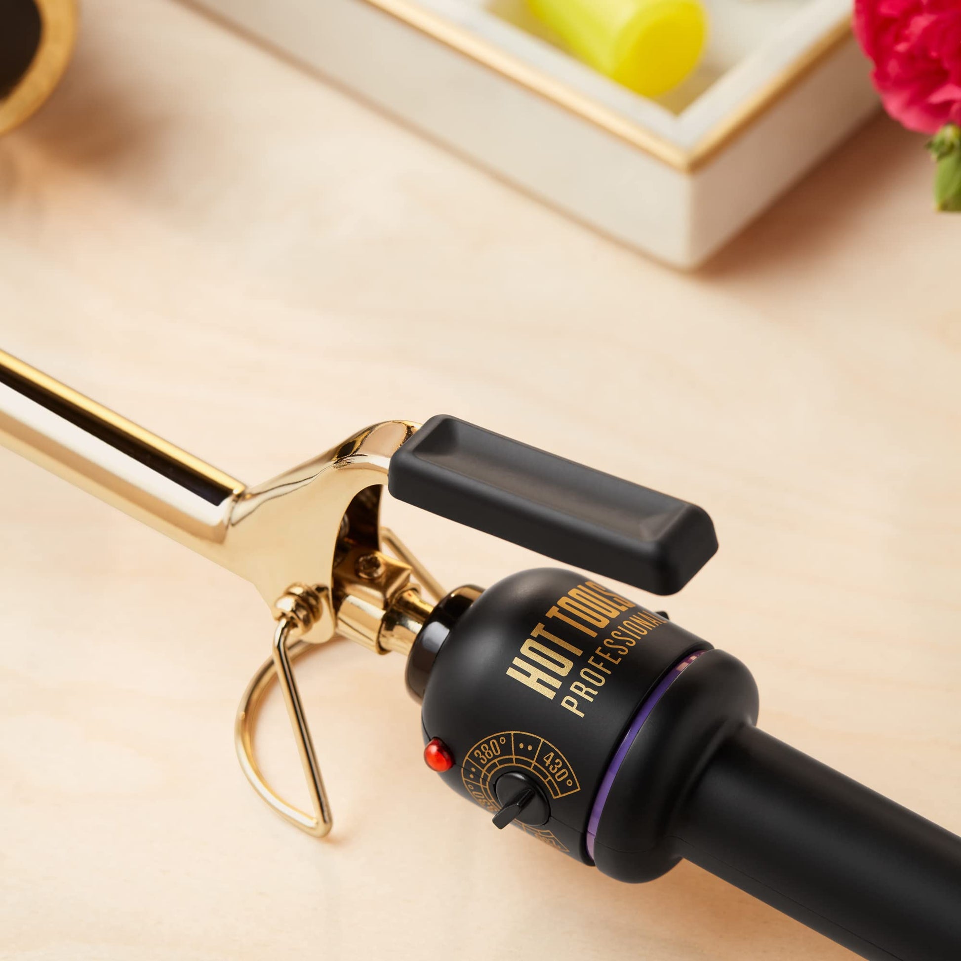 Hot Tools 0.5 inch curling iron with swivel cord extended