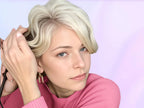 Woman using Farery thermal brush for hair touch up