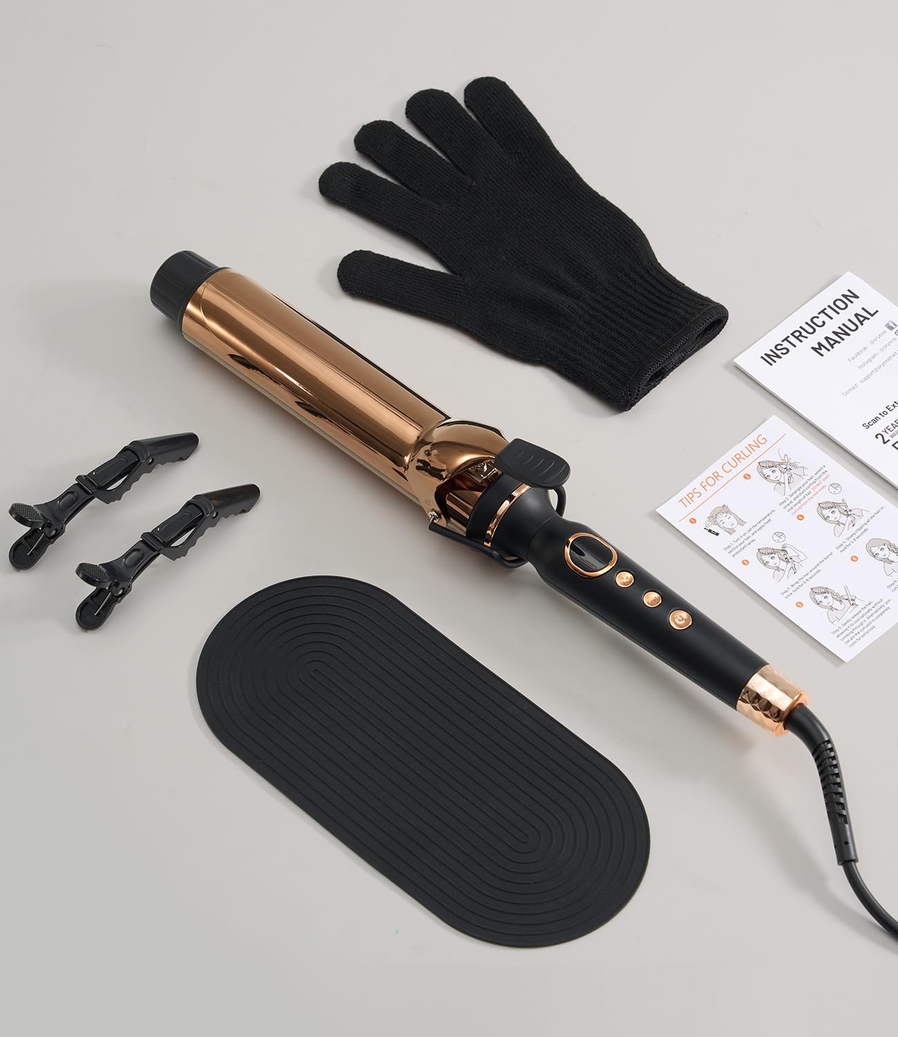 Packaging and contents of Orynne titanium styling iron for long hair