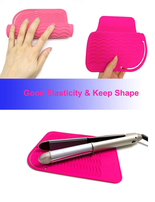 Pink AFT90 heat resistant mat holding a curling iron on a vanity