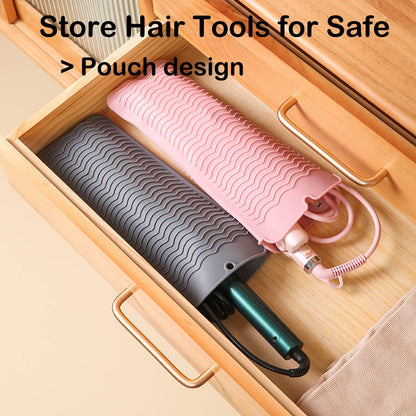 Uorneri pink heat resistant mat holding a hair straightener