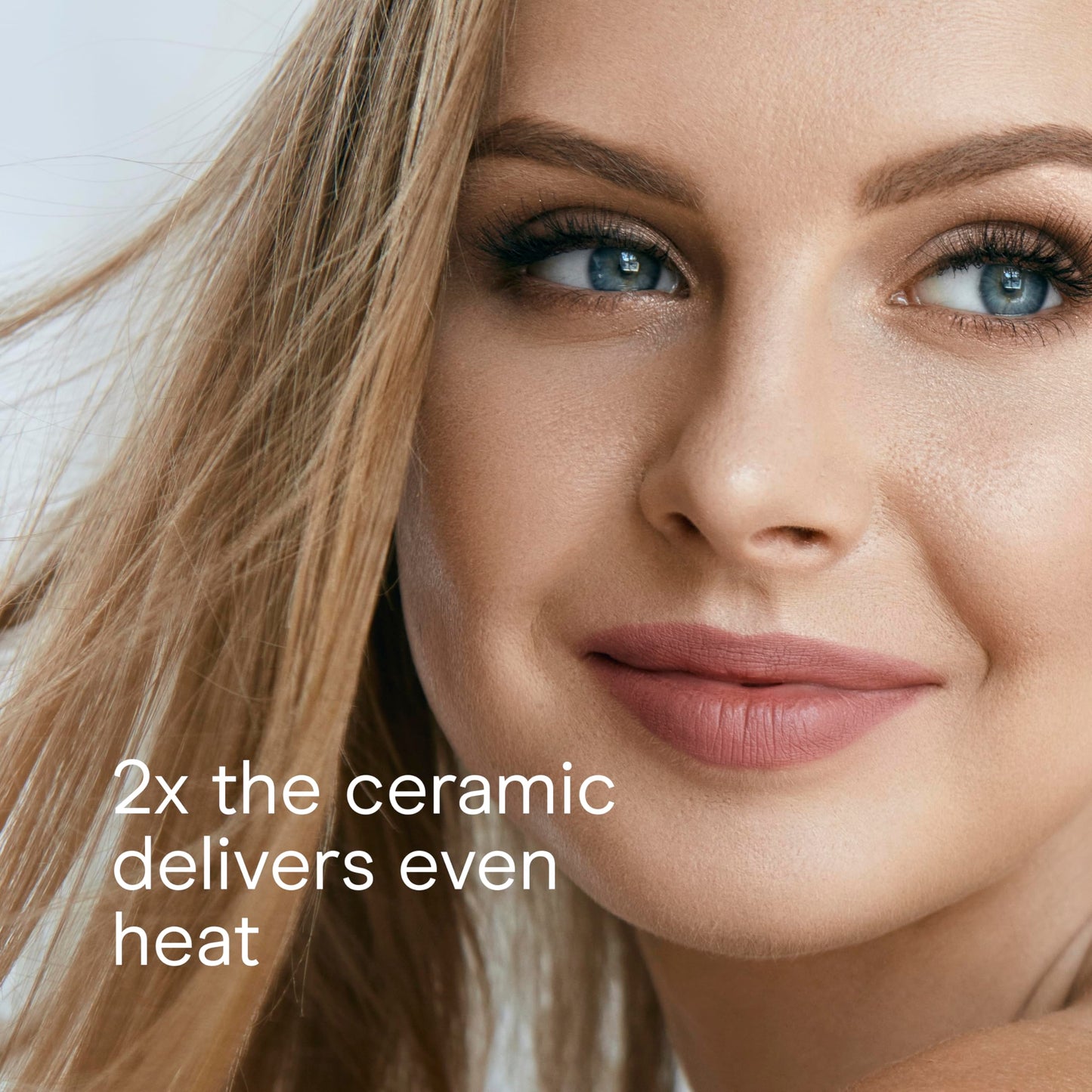 White Conair flat iron with styling accessories