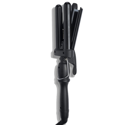 Close-up view of the adjustable temperature control buttons on the Amika hair waver handle