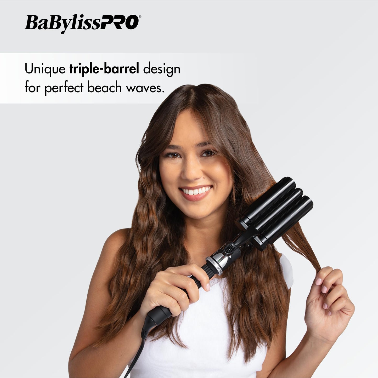 Close up look at the three premium porcelain ceramic barrels of the BaBylissPRO beach wave hair iron.