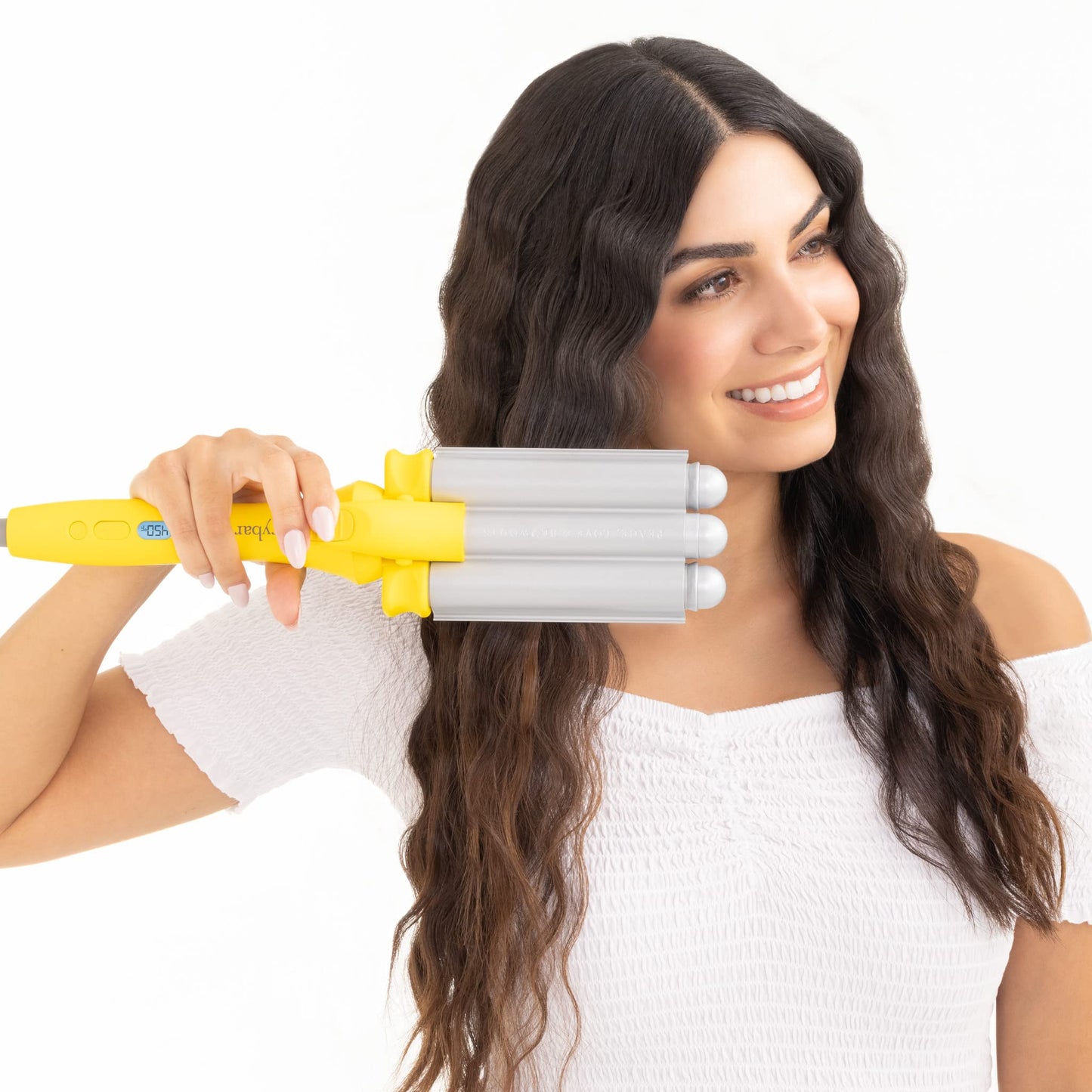 Drybar ceramic wave iron showing clamp tension mechanism