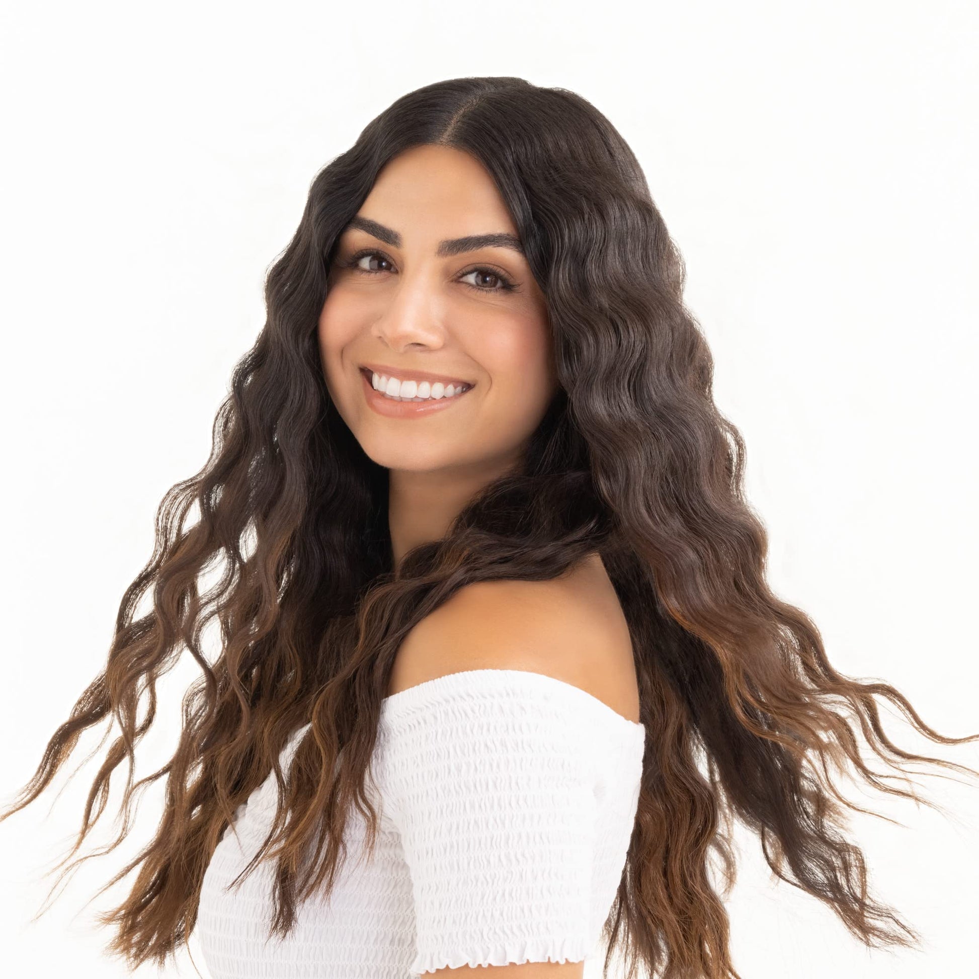 Drybar yellow hair waver tool placed on salon counter