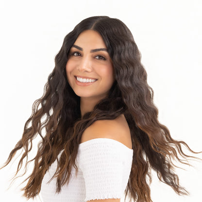 Drybar yellow hair waver tool placed on salon counter
