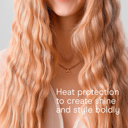 A top-down view of the authentic Conair double ceramic professional mermaid wave tool.