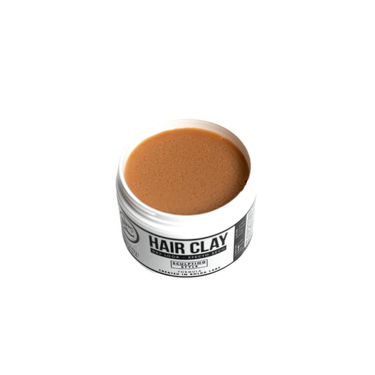 Rolda styling clay tub angled shot highlighting the premium packaging and product description