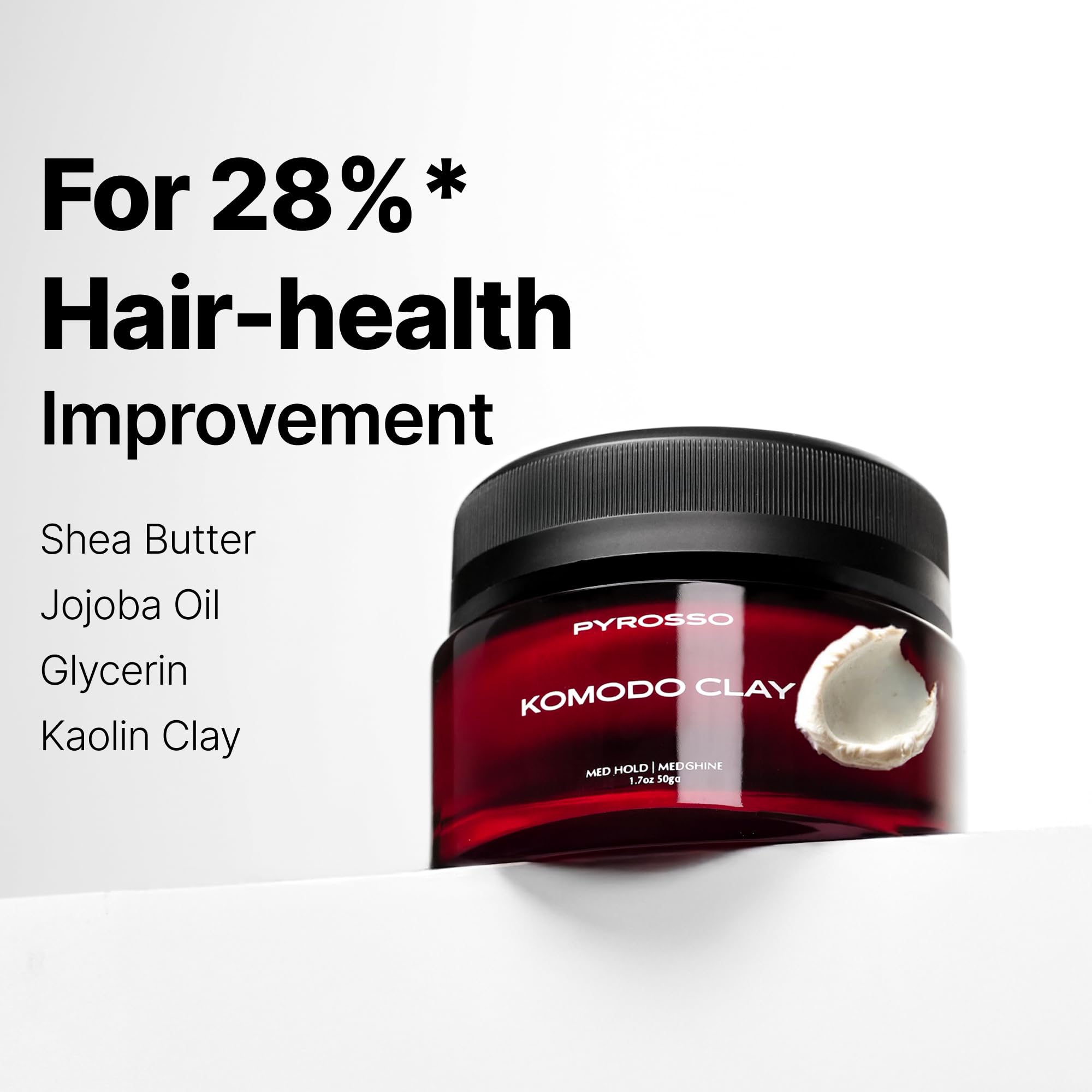 Pyrosso Komodo Matte Finish Hair Clay open jar showing the smooth texture.