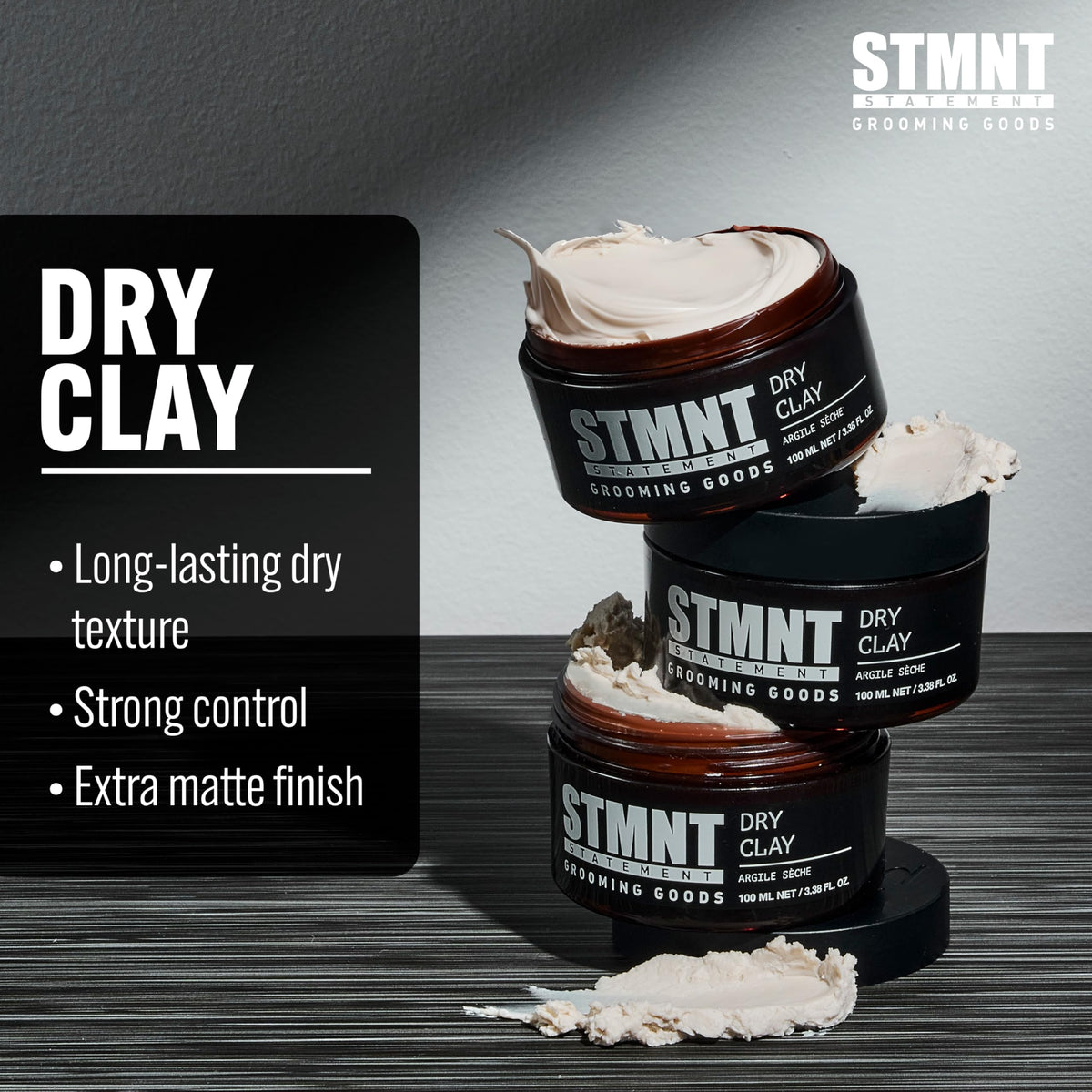 STMNT extra matte finish strong hold clay open container displaying product texture