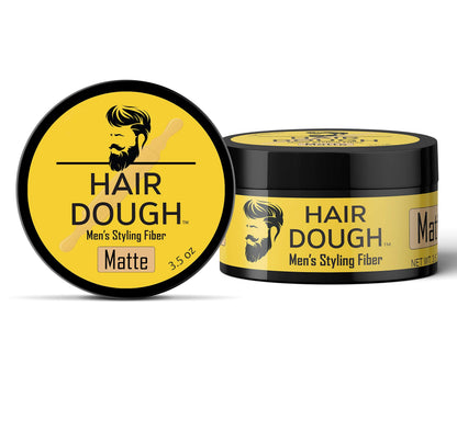 Open jar of matte finish molding clay displaying the smooth texture of the hair wax.