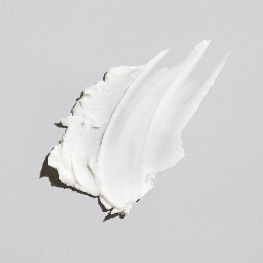 Flow Bros low shine hair clay jar featuring white silhouette logo