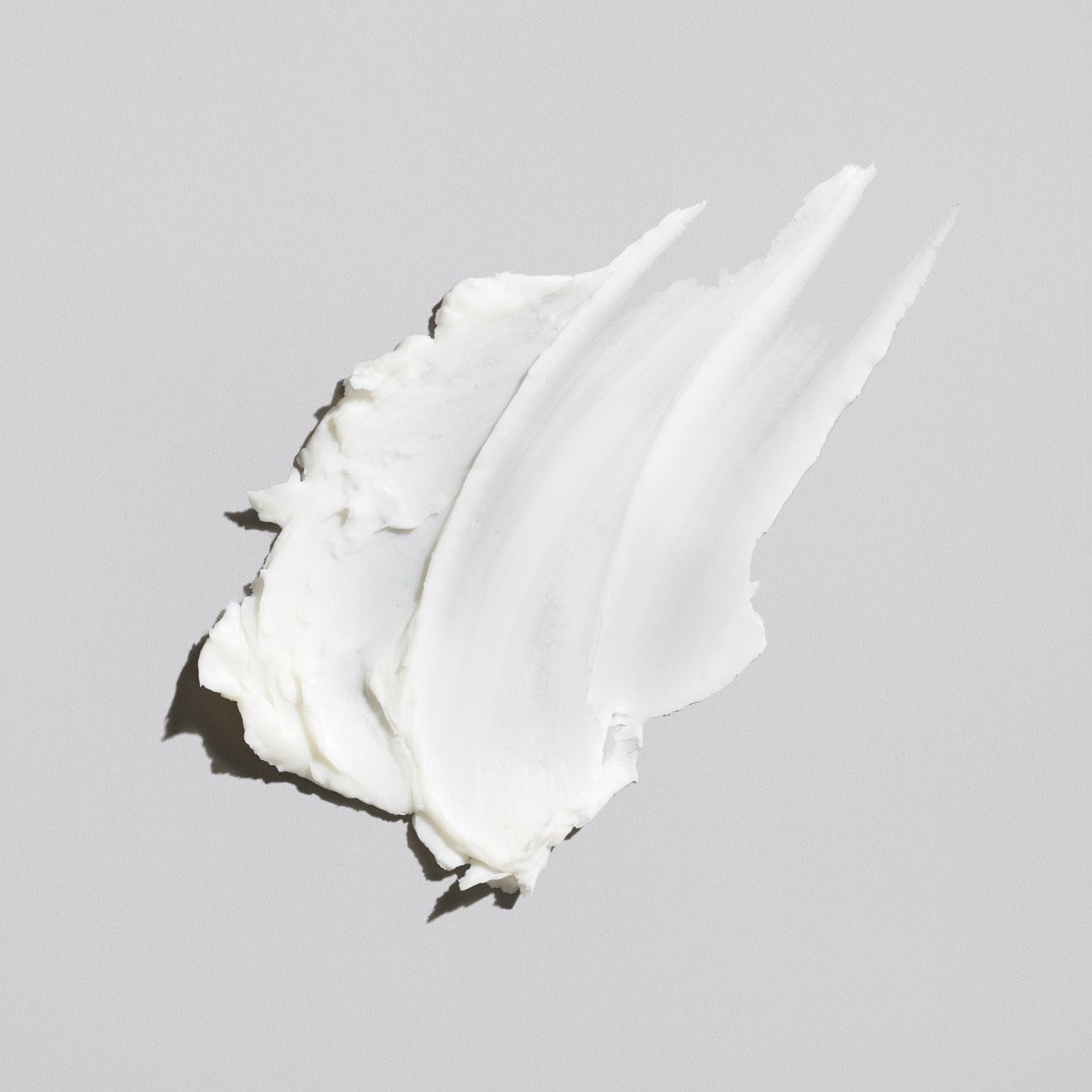 Flow Bros low shine hair clay jar featuring white silhouette logo