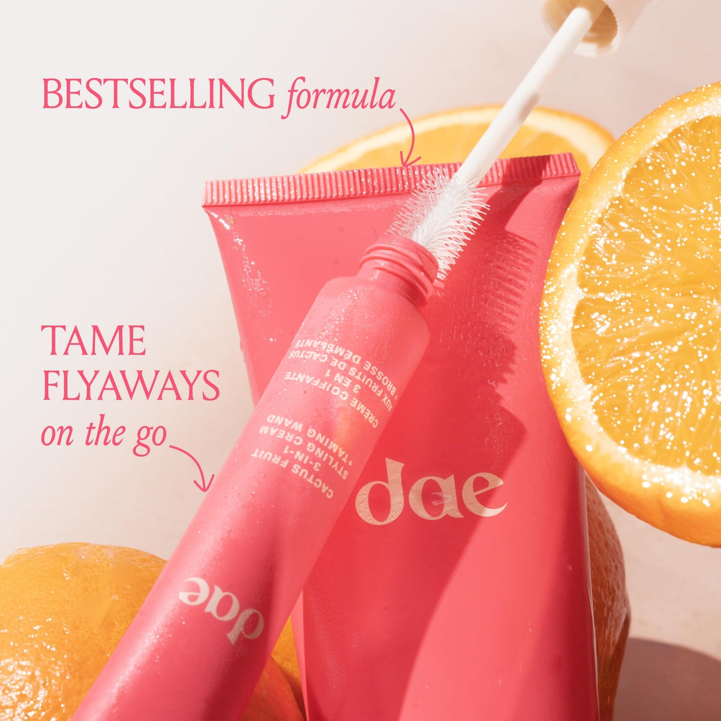 Applying DAE hair styling cream wand to smooth stray baby hairs