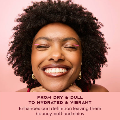 SheaMoisture coconut and hibiscus hair moisturizer jar on a clean background