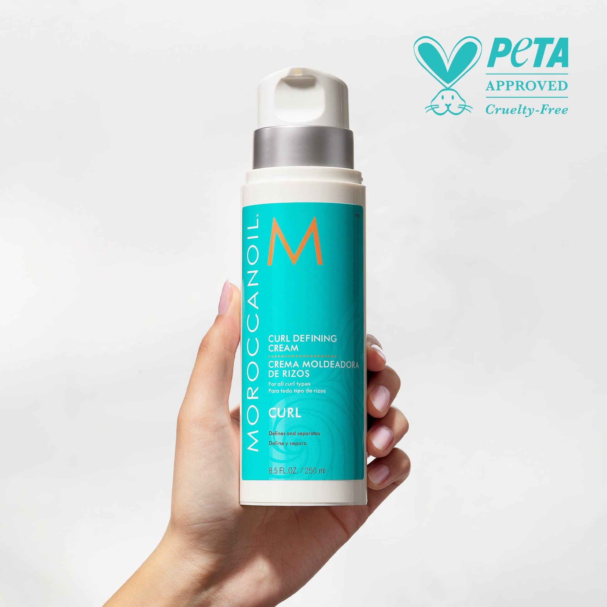 Moroccanoil curl defining cream pump mechanism and white label.