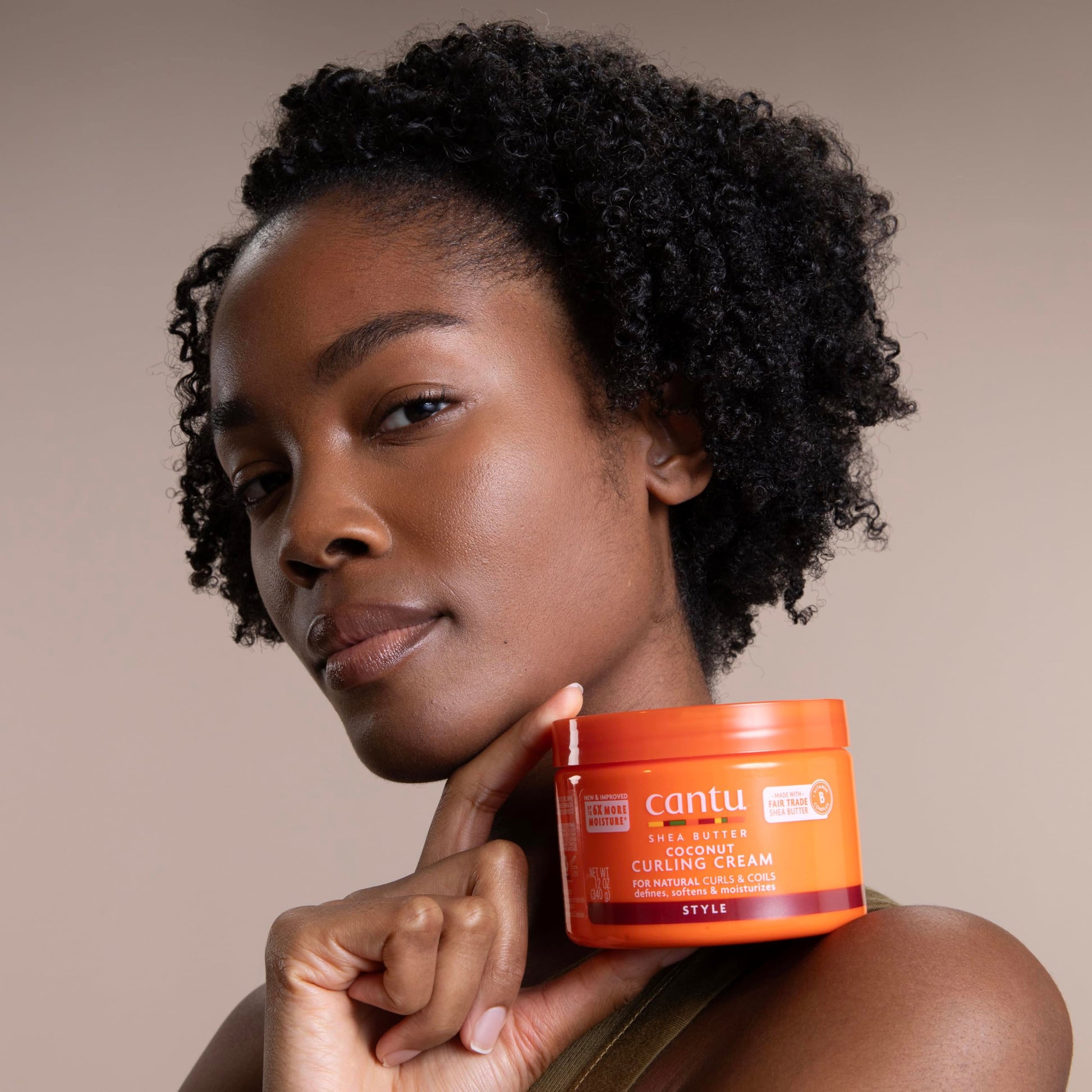 Frizz reducing Cantu moisturizing styling cream for natural textured hair