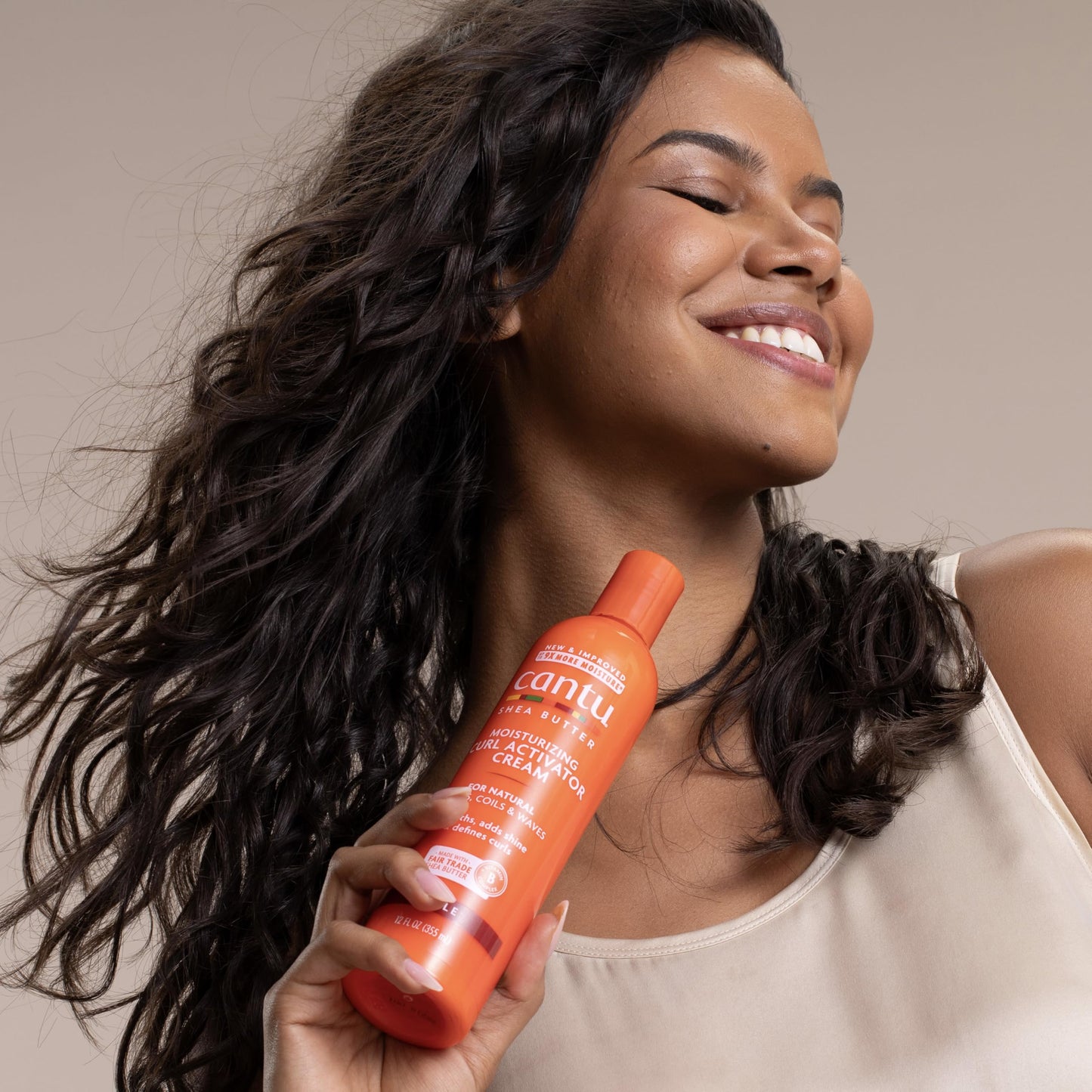 Cantu natural hair moisturizing cream for waves curls and coils